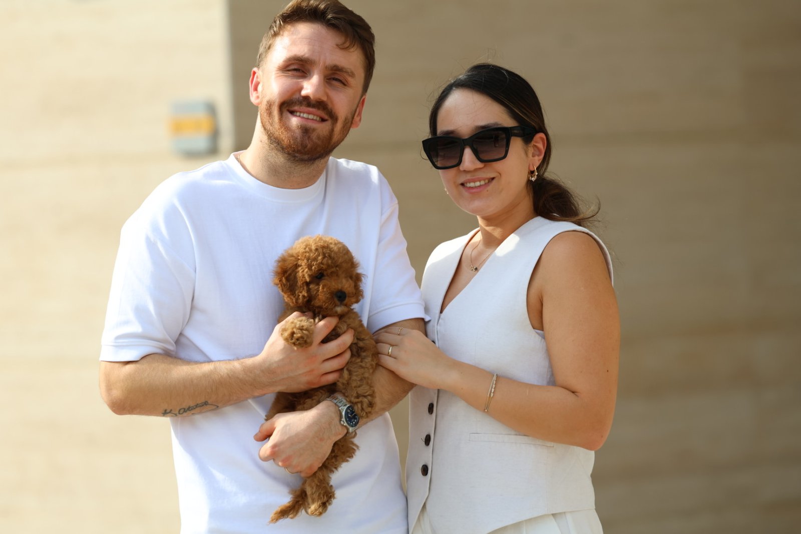 Happy client with puppy in UAE