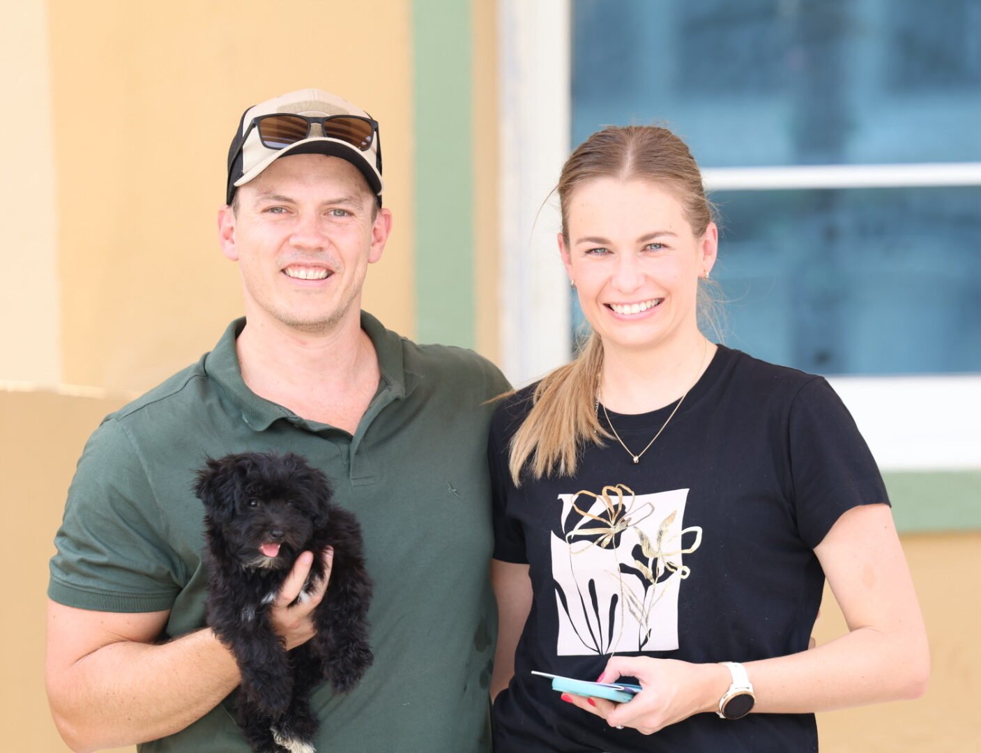 Happy client with puppy in UAE